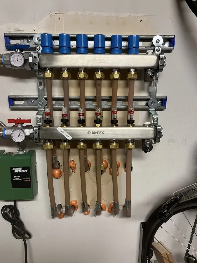 Plumber performing Gas Line Installation at a residential property in Three Lakes